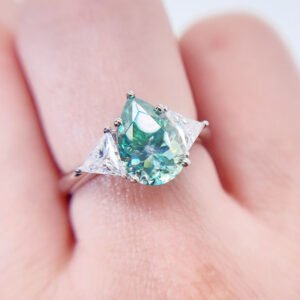 White Gold Three Stone Design Pear Cut Tiffany Blue Moissanite Ring For Women - Image 2